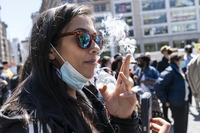 People congregate on Union Square for the Annual Cannabis rally to celebrate legalization of recreational marijuana in New York State, May 1, 2021.